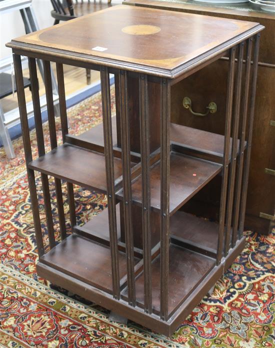 An inlaid mahogany revolving bookcase